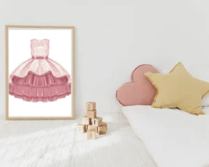 A bedroom with a pink dress and gold pillows