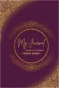 A purple and gold cover of the book my journal