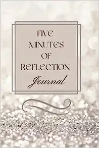 A silver and white five minutes of reflection journal