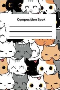 A composition book with many cats on it.