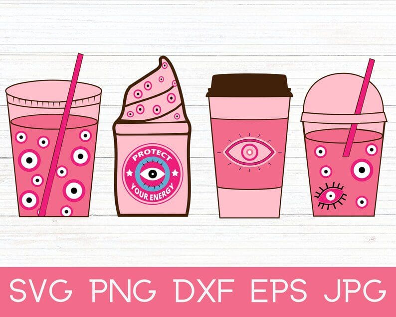 A pink cup of coffee with different designs on it.